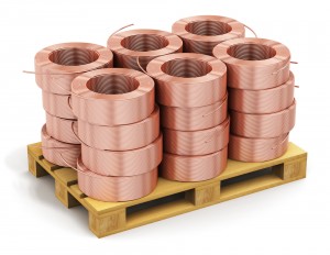 Stacked hunks of copper cable on shipping pallet